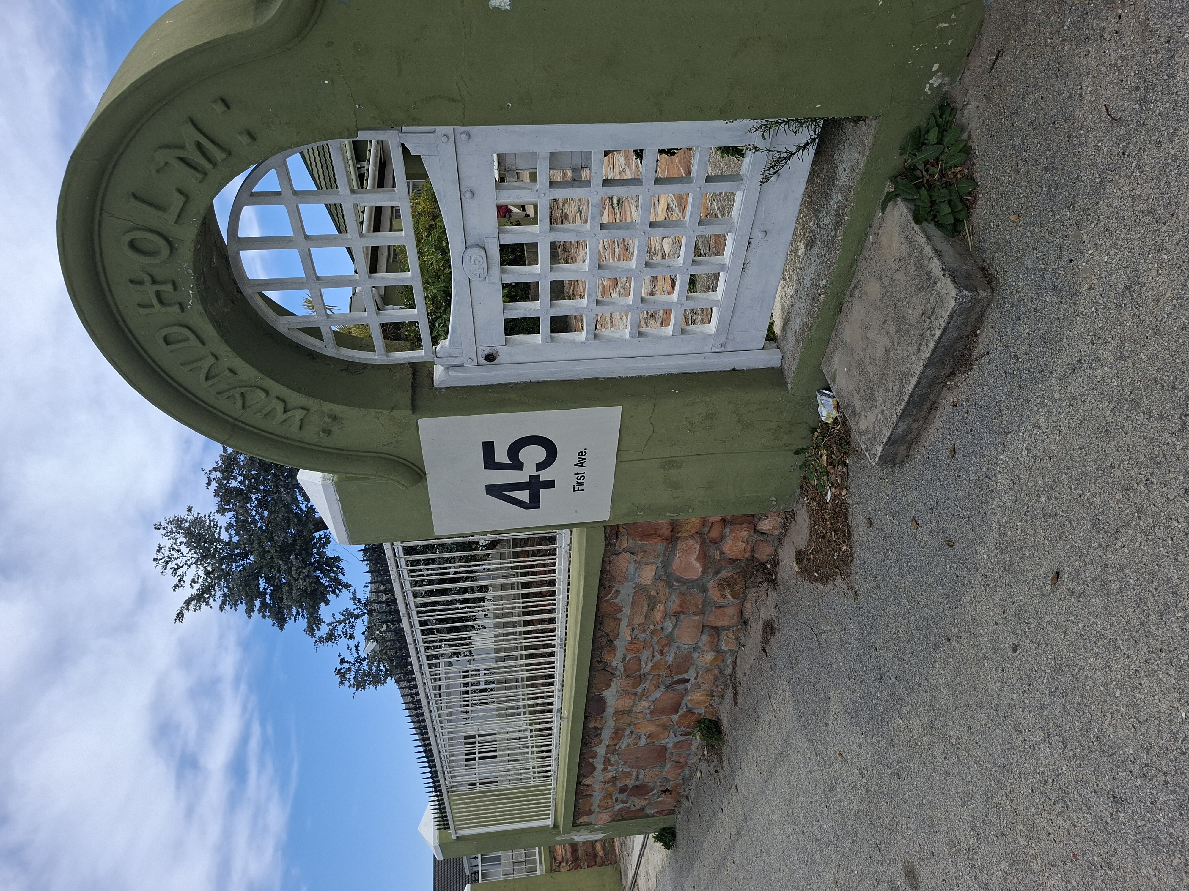 Stylist finishing a precise haircut in Port Elizabeth